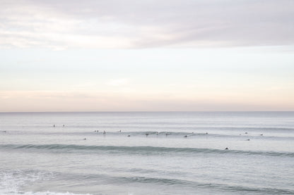 Surfers in the ocean at Del Mar, California, with a hazy peaceful feel, by Salt Creek Prints