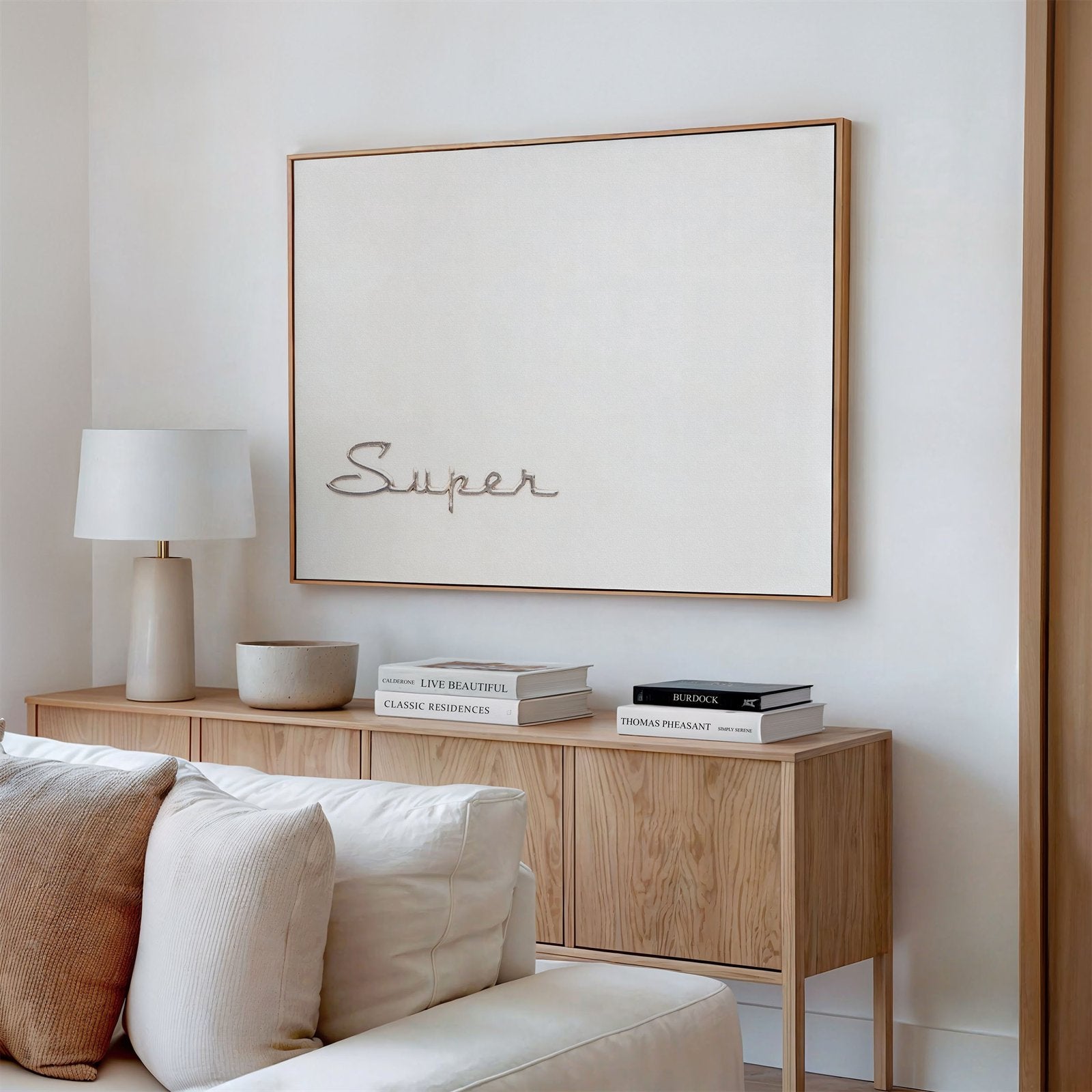 Framed canvas photo of: Super 7772 displayed on a wall above a couch in a modern neutral room.