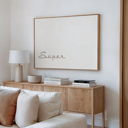 Framed canvas photo of: Super 7772 displayed on a wall above a couch in a modern neutral room.