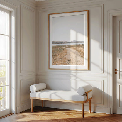 Framed photo of: Tomales Bay 7148 displayed on a wall above a bench in a luxury hallway.