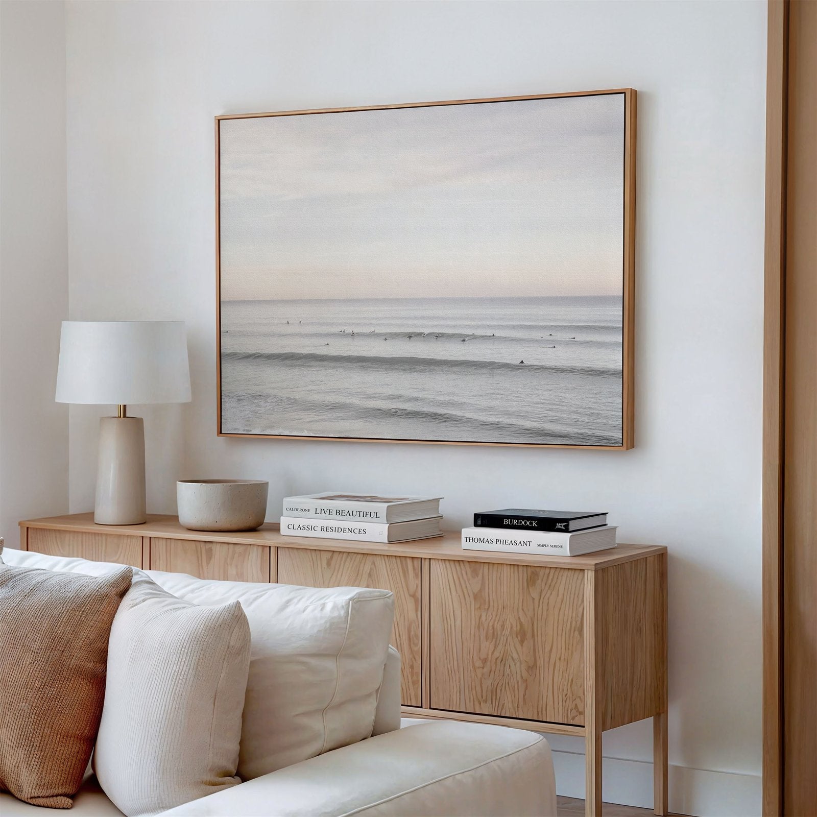 Framed canvas photo of: Del Mar 9616 displayed above a console in a modern living room.