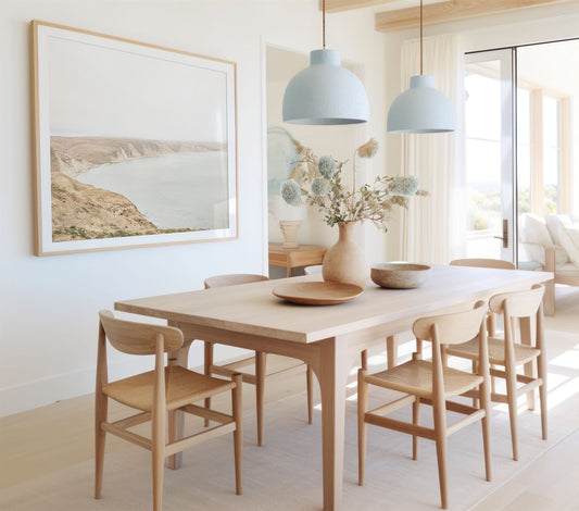 Framed photo of: Drakes Bay 7270 displayed on a wall in a coastal dining room.