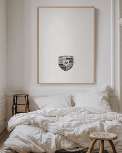 Framed photo of: Porsche 8364 displayed on a wall above a bed in a cozy bedroom.