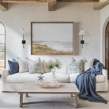 Framed photo of: Salmon Creek Beach 7456 displayed on a wall behind a couch.