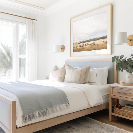 Framed photo of: Point Reyes 7153 displayed above a bed in a coastal room.